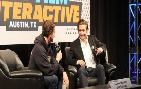 Jake Gyllenhaal being interviewed on stage