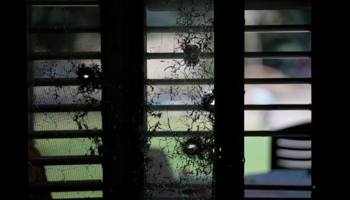 Bullet-shattered window of a house at Kibbutz Kfar Aza