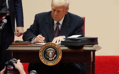 trump signing papers